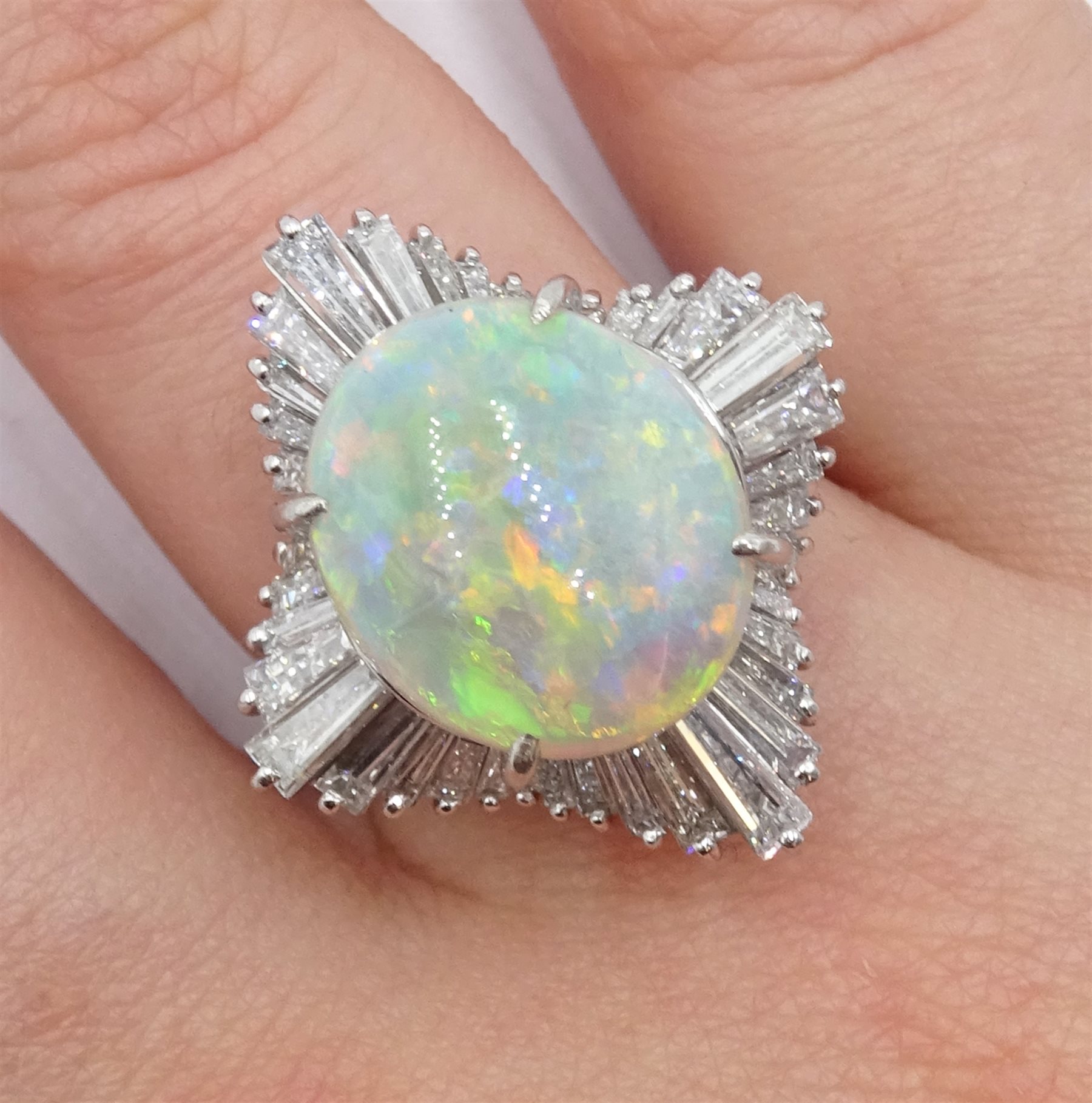 Platinum oval cabochon opal and baguette diamond ring, stamped 900 ...