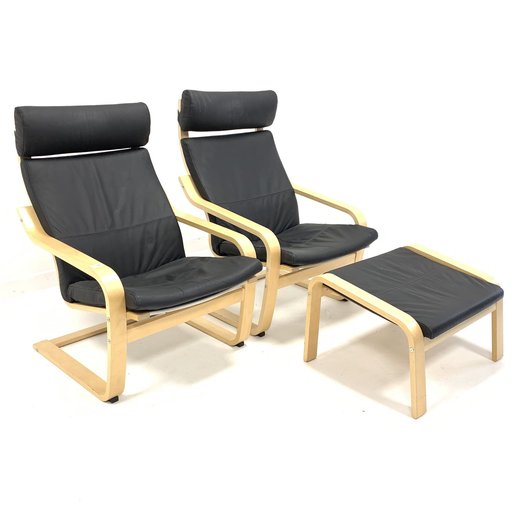 Pair of 'Ikea Poang' lounge chairs with leather upholstered cushions
