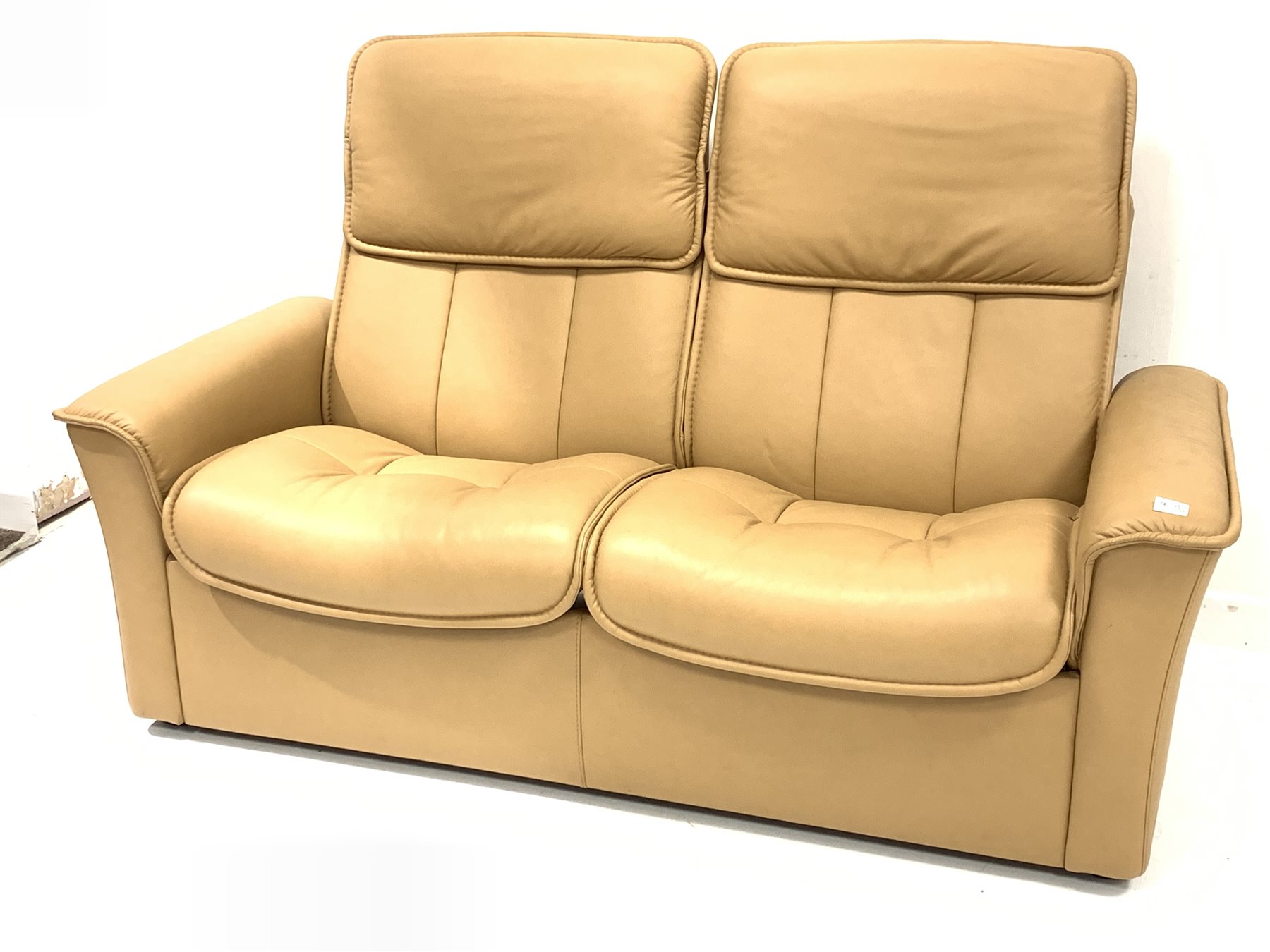 tan leather reclining sofa