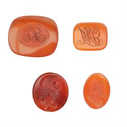 Collection of loose seals including a 19th century double-sided carnelian oval intaglio engraved seal inscribed 'Notre Amitie est Aussy Iuste' translating to 'Our Friendship is also Fair' with central sun dial and bust of a gentleman verso, L2cm, another inscribed 'Alls' and engraved with a wishing well, together with seven other examples (9)