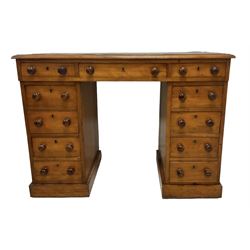 Victorian mahogany twin pedestal desk, rectangular top with inset green leather writing surface, fitted with central frieze drawer flanked by five graduating drawers on each side 