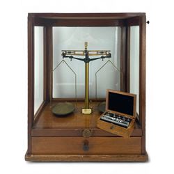 Early 20th century mahognay cased set of balance scales by James H Heal & Co Ltd with associated cased weights, H53cm x W44cm 