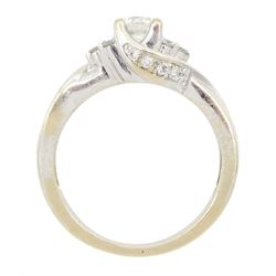 18ct gold round brilliant cut diamond ring, central diamond flanked by groups of smaller diamonds, hallmarked, principal diamond weight approx 0.25 carat