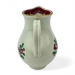 18th century Worcester sparrow beak jug, hand painted in polychrome enamels with floral bouquets and sprig within pink scale borders, with ribbed loop handle, H10cm