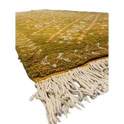 Moroccan citrine ground thick pile runner rug, the field decorated with geometric design and interspersed tribal motifs, enclosed by a chevron pattern guard band