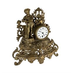 19th century - French gilt spelter 8-day timepiece mantle clock, with an ornate rococo case on splayed feet, drum movement with a cast figure of a gardener, flowers and gardening tools, white enamel dial with Roman numerals, minute markers and matching steel moon hands. With pendulum.   