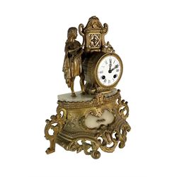 French - late 19th century 8-day mantle clock with two matching five light candelabra, gilt spelter case with alabaster panels and plinth, drum movement and standing figure from classical antiquity, enamel dial with Roman numerals, minute markers and steel hands, with a twin train countwheel striking movement striking the hours and half-hours on a bell. With pendulum. 