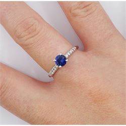 White gold round cut sapphire ring, with diamond set shoulders, hallmarked 14ct, sapphire approx 0.50 carat