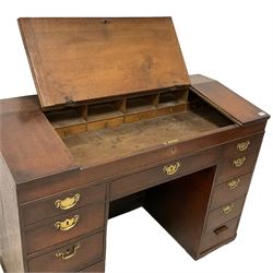 George III oak kneehole clerk's desk, hinged sloping lid enclosing six correspondence drawers and pigeonholes, fitted with central frieze drawer flanked by ten graduating drawers 