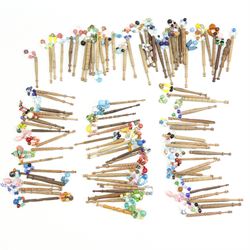 Collection of turned wooden lace maker's bobbins, including 19th century and later examples, mostly with glass spangles and turned shafts (100 approx)