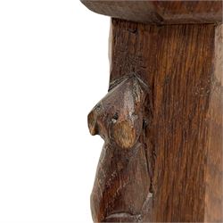 Mouseman - circa. 1930s set of six (4+2) oak dining chairs, panelled back carved with the Bagshawe family crest, the moto 'Forma Flos Fama Flatus' over an arm grasping a bugle-horn with ribbon tie and Yorkshire rose motif, adzed frame, leather lattice strap seat, on octagonal supports united by stretchers, two carvers and four side chairs, each carved with mouse signature, by Robert Thompson of Kilburn 

Provenance - the chairs were owned by Edward Bagshawe, the eldest son of the Staithes Group artist J.R. Bagshawe. On the death of Edward they were passed to the vendor. They have been in the family for almost 95 years. 