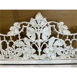 Coalbrookdale design - early 20th century cast iron oak leaf and acorn bench, white painted cast iron frame with slatted wooden seat, the pierced and shaped back decorated with scrolling oak branches and leafage, flanked by dog mask arm terminals over cabriole supports with paw feet 