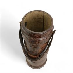 Late 19th century leather shot carrier, with carrying handle, stamped N with broad arrow, H62cm