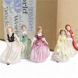  Set of eight Royal Doulton serviette rings with applied floral decoration, five Doulton Silicon miniature vases and five Royal Doulton miniature figures by J Peers