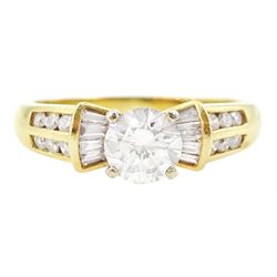 18ct gold round brilliant cut diamond ring, with channel set tapered baguette and round brilliant cut diamond shoulders, stamped, principal diamond weight approx 0.75 carat, total diamond weight approx 1.15 carat