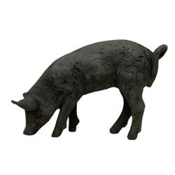Cast composite garden figure of a piglet 