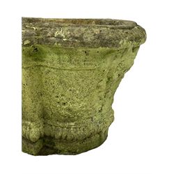 Pair of cast stone garden planters, rectangular form with stepped rounded ends, foliate moulded rim, the body decorated with floral and fruit festoons over gadrooned moulding