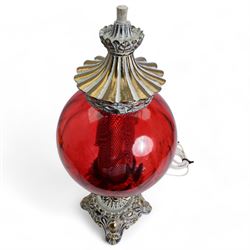 Vintage pierced brass table lamp in the form of an oil lamp, with red glass shade, H61cm