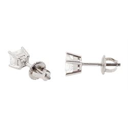 Pair of white gold princess cut diamond stud earrings, total diamond weight 1.00 carat, with World Gemological Institute report