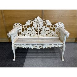 Coalbrookdale design - early 20th century cast iron oak leaf and acorn bench, white painted cast iron frame with slatted wooden seat, the pierced and shaped back decorated with scrolling oak branches and leafage, flanked by dog mask arm terminals over cabriole supports with paw feet 