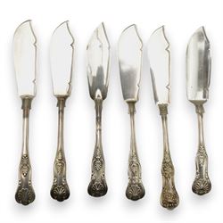 A matched set of 19th century silver Kings pattern cutlery comprising six table spoons, ten table forks, twelve dessert spoons, fish slice, pair of sauce ladles, ten teaspoons, six fish knives, seven silver handled knives, two salt spoons  and fifteen dessert forks, various dates and makers 