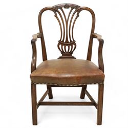 Georgian mahogany open armchair,pierced vase shaped splat carved curled leafage, serpentine tan leather studded seat