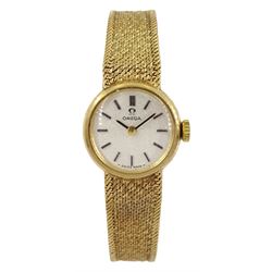 Omega ladies 9ct gold manual wind wristwatch, London 1973, on integrated 9ct gold bracelet, hallmarked 