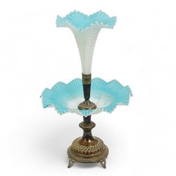 19th/ early 20th century silver-plate and satin glass epergne, having a single frilled blue satin glass trumpet vase with matching bowl beneath, on gadrooned column and base, with scroll bracket feet, H45cm