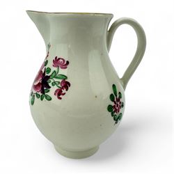 18th century Worcester sparrow beak jug, hand painted in polychrome enamels with floral bouquets and sprig within pink scale borders, with ribbed loop handle, H10cm