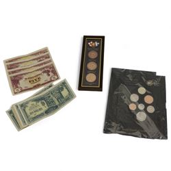 Royal Mint Royal Shield of Arms Brilliant Uncirculated coin collection, a framed 'Royal Family Collection' set of three coins and a collection of twelve Japanese Government ten dollar notes and four five dollar notes 