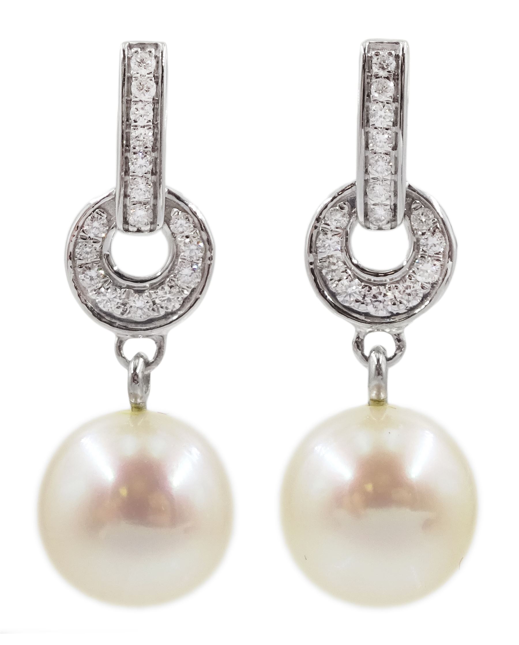 Pair of 9ct white gold diamond and pearl pendant stud earrings, stamped ...