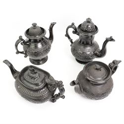 Early 19th century and later black basalt tea wares, mostly with relief or engine-turned bodies, including four large teapots, one with bird finial, bachelors teapots etc in one box