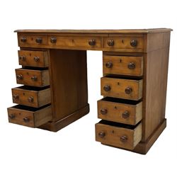 Victorian mahogany twin pedestal desk, rectangular top with inset green leather writing surface, fitted with central frieze drawer flanked by five graduating drawers on each side 