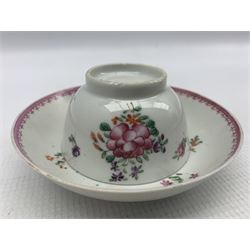 18th century and later porcelain comprising two handled creamware loving cup with floral decoration 12cm Worcester fluted tea cup and saucer decorated in blue and white with floral sprays together with later Chinese famille rose tea bowl and saucer  (3)
