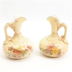 Pair of Royal Worcester porcelain blush ivory ewers, each decorated with floral sprays, puce marks, number 1136, H12cm