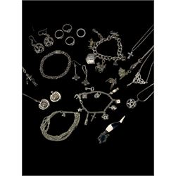 Group of silver jewellery, including Mexican silver fox brooch, two silver charm bracelets, a Byzantine link chain bracelet, articulated fish pendant on chain, articulated puppet pendant on chain, various pairs of earrings, rings, bracelets, etc