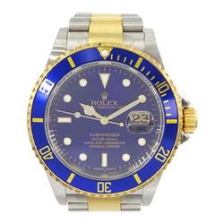 Rolex Oyster Perpetual Date Submariner gentleman's stainless steel and gold automatic wristwatch, No. 16613, serial No. Z655102, sunburst blue dial with luminous hour markers, boxed with guarantee card dated 2008