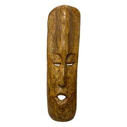 Large carved wooden tribal style wall mask, L132cm 