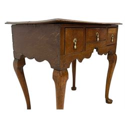 18th century oak low-boy, rectangular moulded top over three drawers with scratch mouldings, shaped apron, on cabriole supports