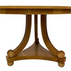 Contemporary Regency design oak and maple extending dining table - two D-ends with maple cross banding, on three curved pillar supports decorated with turned roundels, concaved triangular platform on turned bun feet, with additional leaf