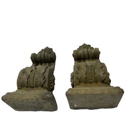 Pair of Victorian design cast stone architectural corbel wall brackets, stepped rectangular top over a scrolled bracket with relief acanthus leaf decoration and rosette motifs to the side