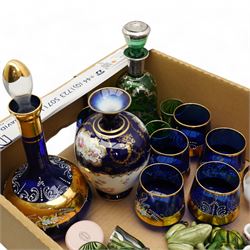 Venetian silvered green glass liquor decanter and six glasses, a Bohemian blue glass liquor decanter and six glasses, two 19th century glass salts, together with a collection of miniature cabinet porcelain and decorative items 