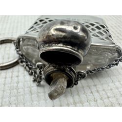 George V silver scent flask, the glass scent flask housed within a pierced silver frame, with hinged cover and suspended from a ring, hallmarked G E Walton & Co Ltd, Birmingham 1911, H5.5cm