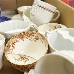 Victorian and later porcelain moustache cups, some with saucers, and related book, in one box