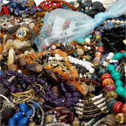 Large collection of costume jewellery including bead necklaces, earrings, bracelets and brooches