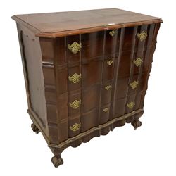 20th century walnut chest with shaped front, moulded top over four drawers, on ball and claw carved feet