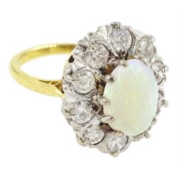 18ct gold opal and round brilliant cut diamond cluster ring, stamped, total diamond weight approx 1.00 carat