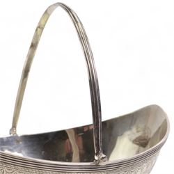 George III silver navette shape sugar basket with reeded loop handle, engraved cartouche and decoration and oval pedestal foot L15cm London 1788 Maker Henry Chawner