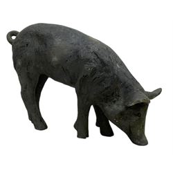 Cast composite garden figure of a piglet 