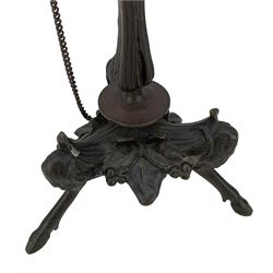 Pair of 19th century French patinated bronze candlesticks in the manner of Ferdinand Barbedienne, the gadrooned sconces hung with chains, reeded columns on tripod supports with hoof feet, H28cm 